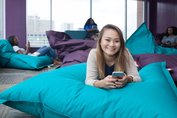 Student enjoys time in common area