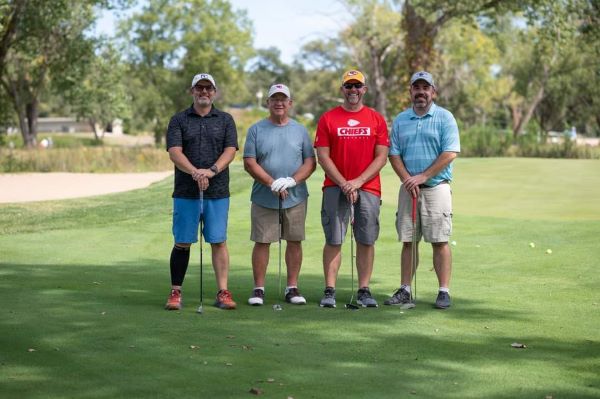 After helping to set up, register players, and prepare for the Geary Community Healthcare Foundation’s annual Fall Classic Golf Tournament, volunteer Nathan Roberts squeezed in a round of golf with the afternoon group.