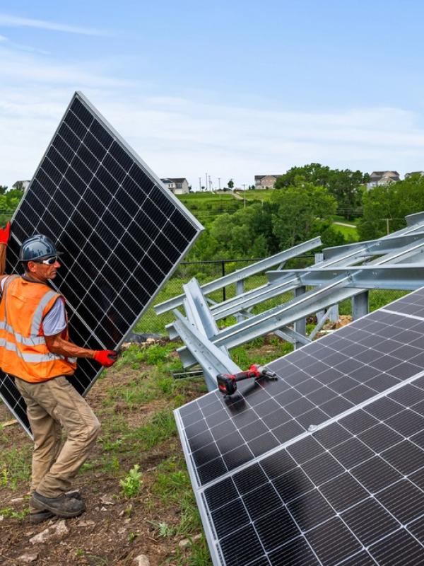 Man installing solar panel