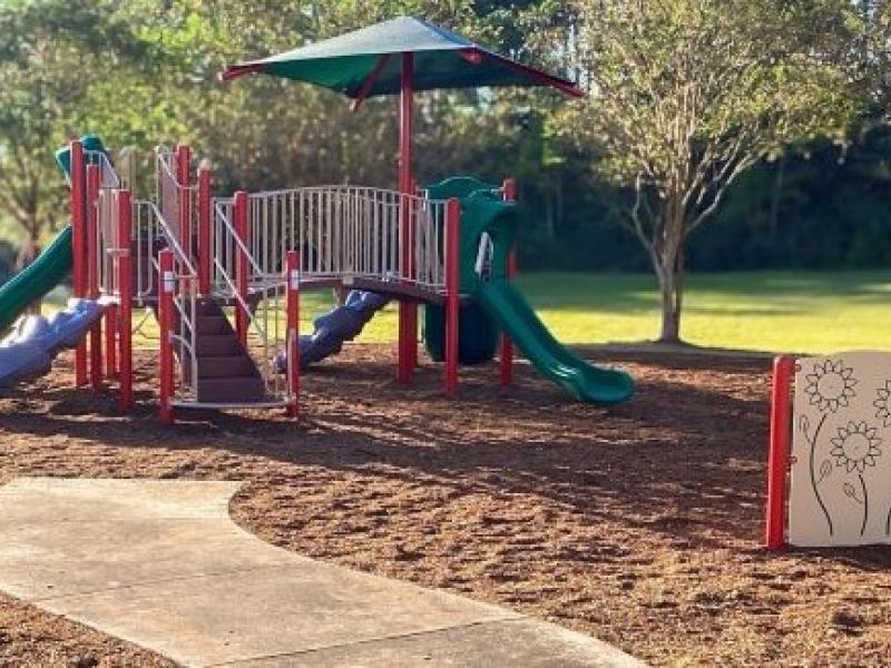 Modernized playgrounds in Fort Johnson military housing communities boast features like slides, climbing walls and jungle gyms.